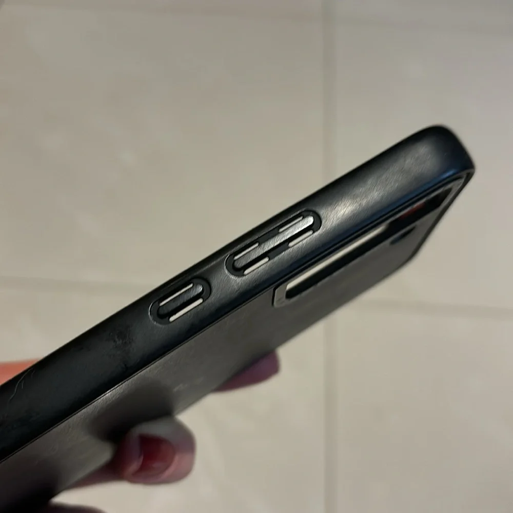 Two Samsung S22 Cases Casetify and Otterbox Black in color